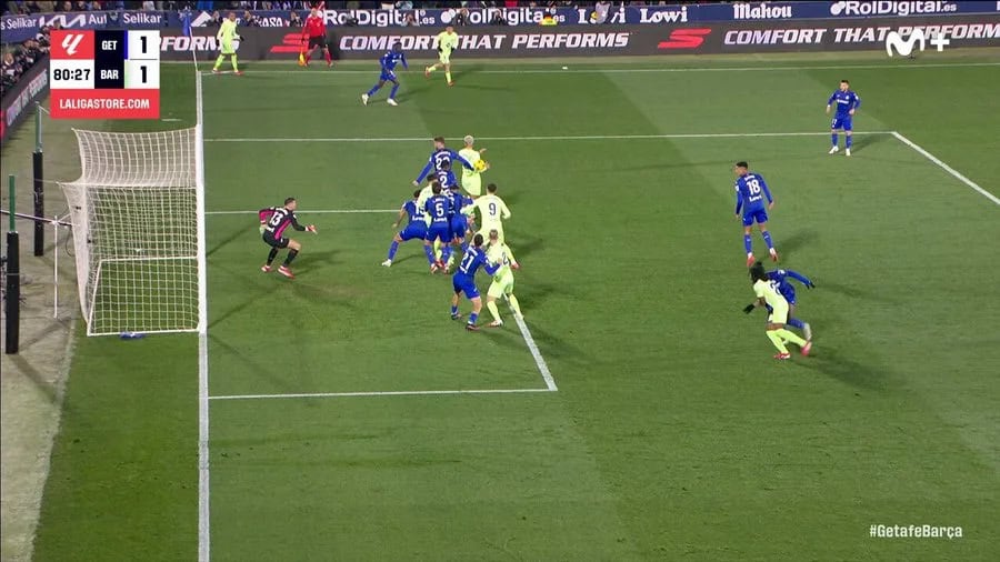 Players in blue and yellow compete fiercely near the goal, with a goalkeeper ready to defend. The intense match sees Getafe tied 1 - 1 with Barca at 80:27. Keep an eye out for a weekly update that might thrill Real Madrid fans as the season progresses.