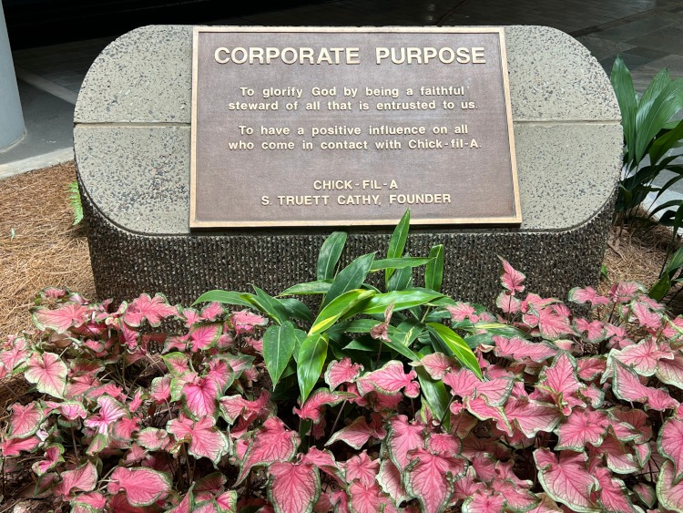 The corporate purpose sign