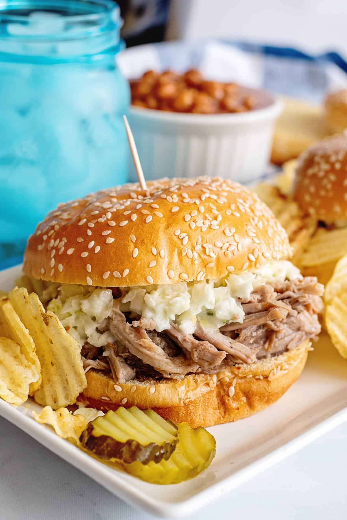 This crock pot pulled pork and slaw burger is one of the best Memorial Day recipes!