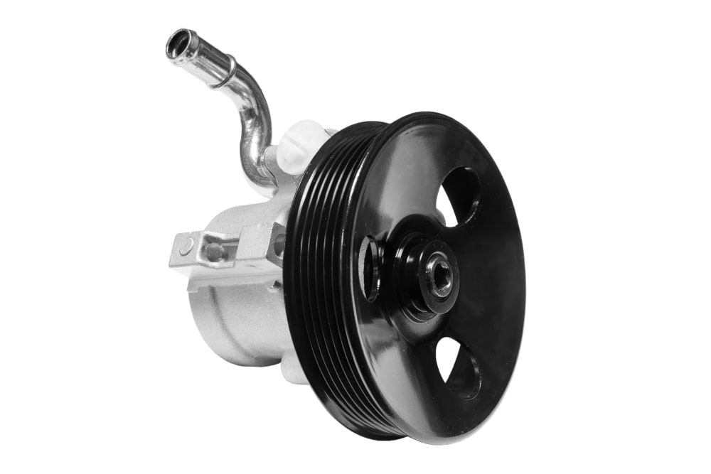 A high definition picture of a hydraulic power steering pump used in car steering system.