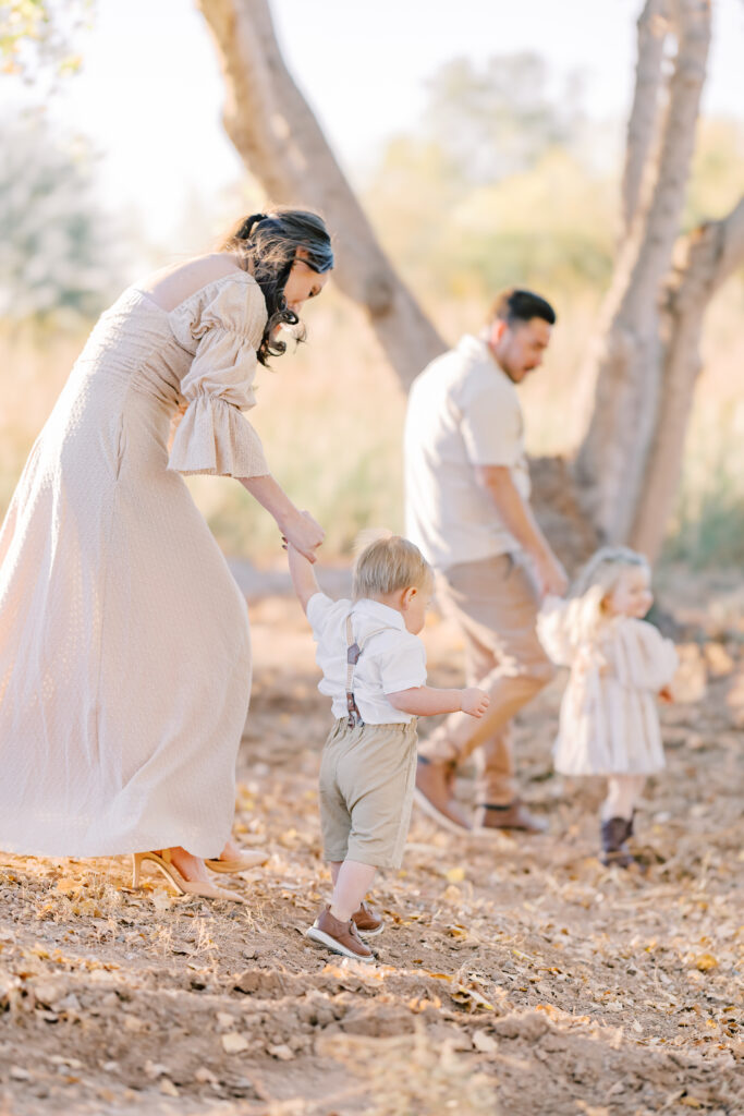 Family explore and spend time together during their family session.