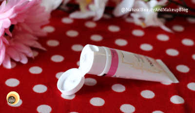 Image of Huygens Paris Bois Rose face wash lying on the surface displaying its tube opening