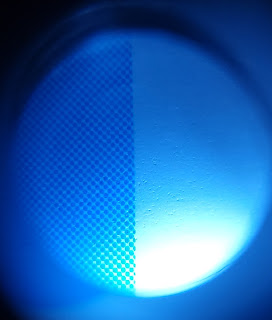 image of "teal" area under magnification, only cyan halftone dots are printed