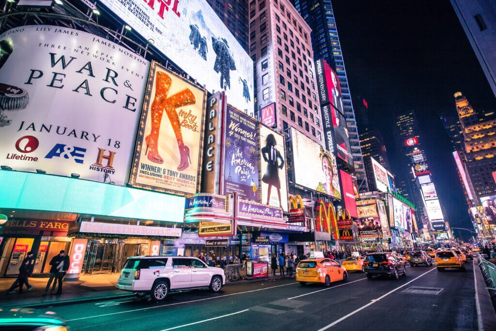New York Time Square at night. New York to California car transport is done daily.