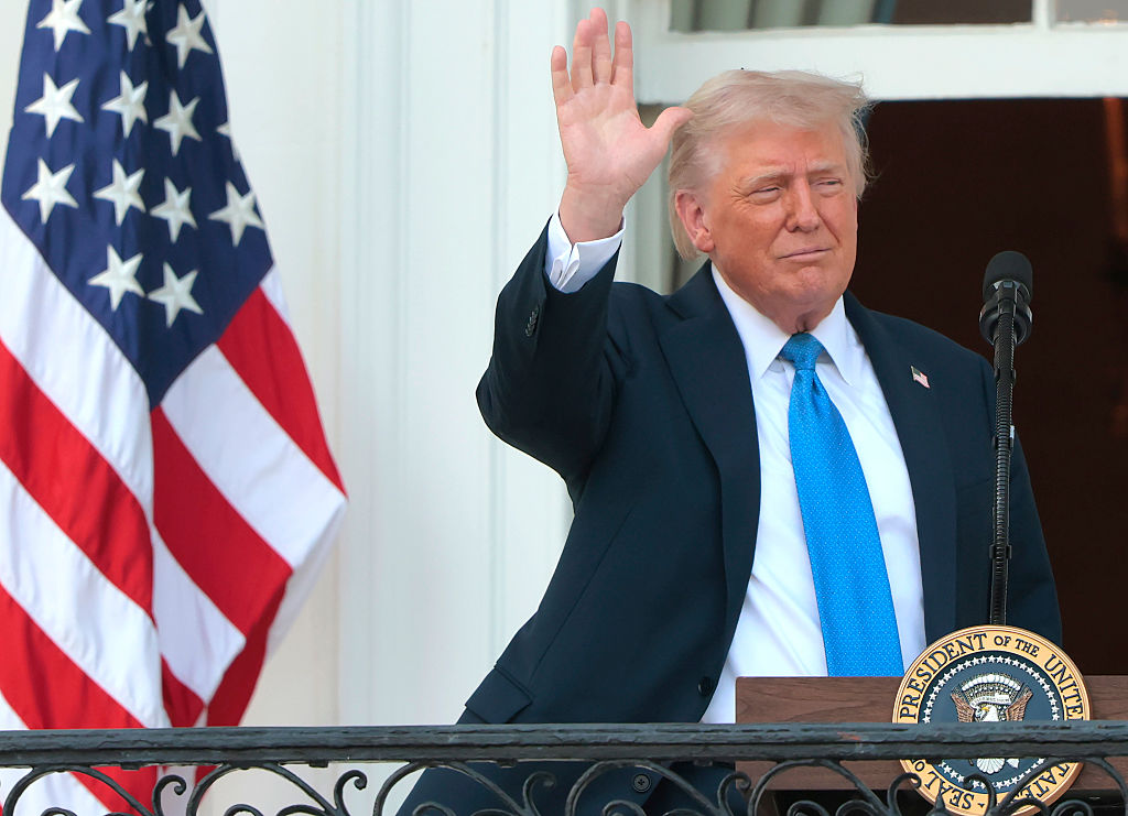 U.S. President Donald Trump waves to guests from South Portico of the White House during an event on the South Lawn in Washington, D.C.. on June 4, 2025. 
