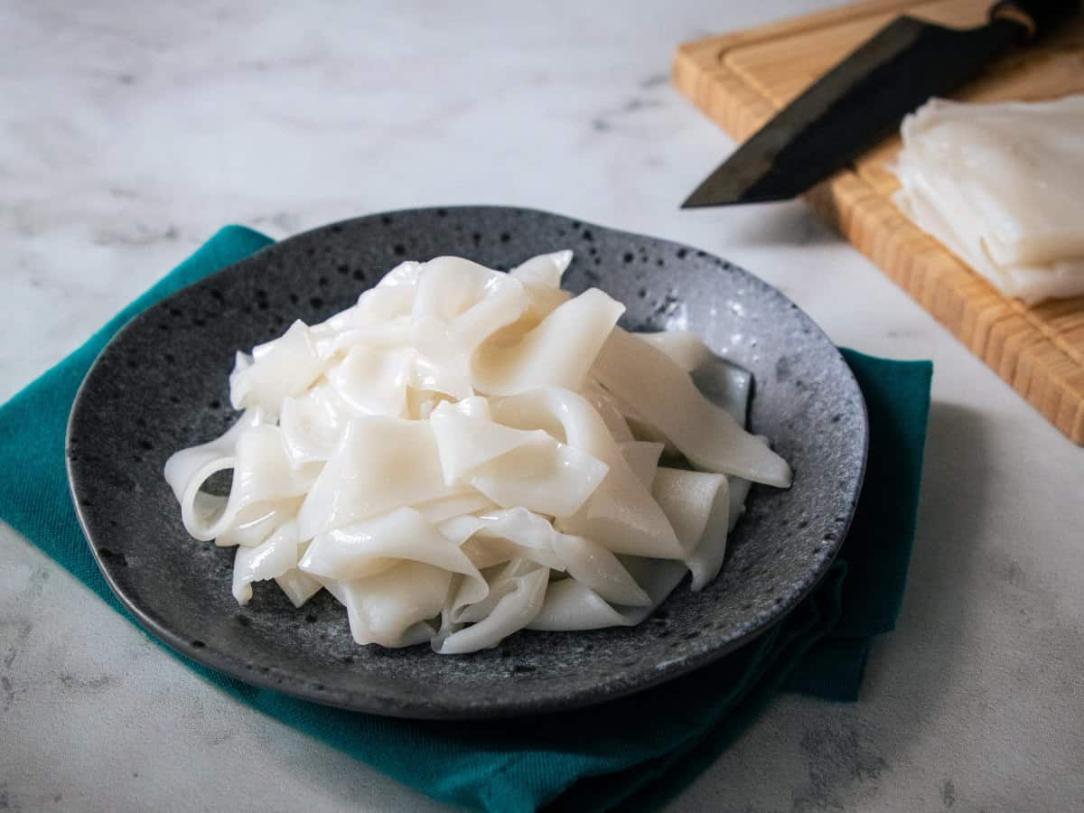 a plate of fresh rice noodles