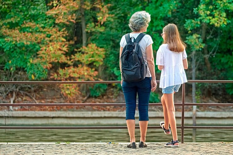 Living authentically - grandmother and granddaughter on a nature walk