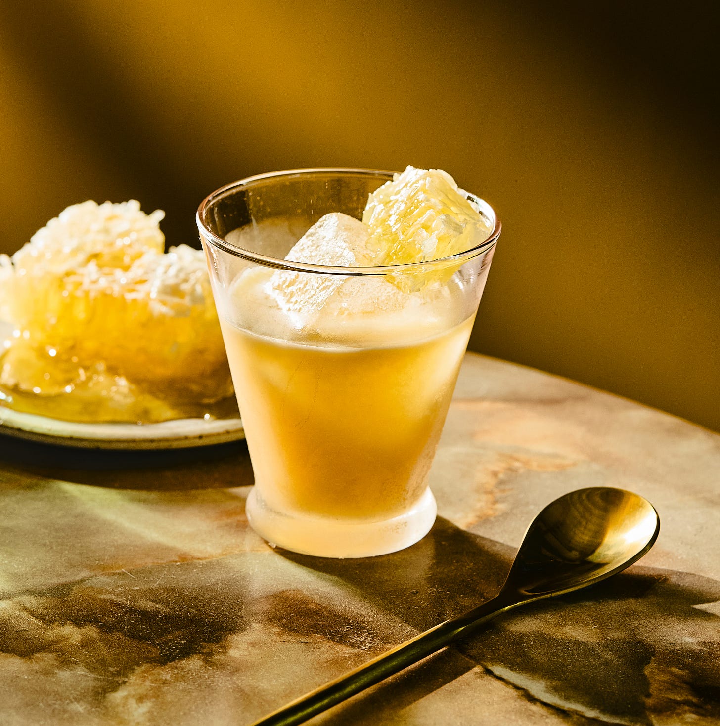 Photo of whiskey sour cocktail on the rocks.