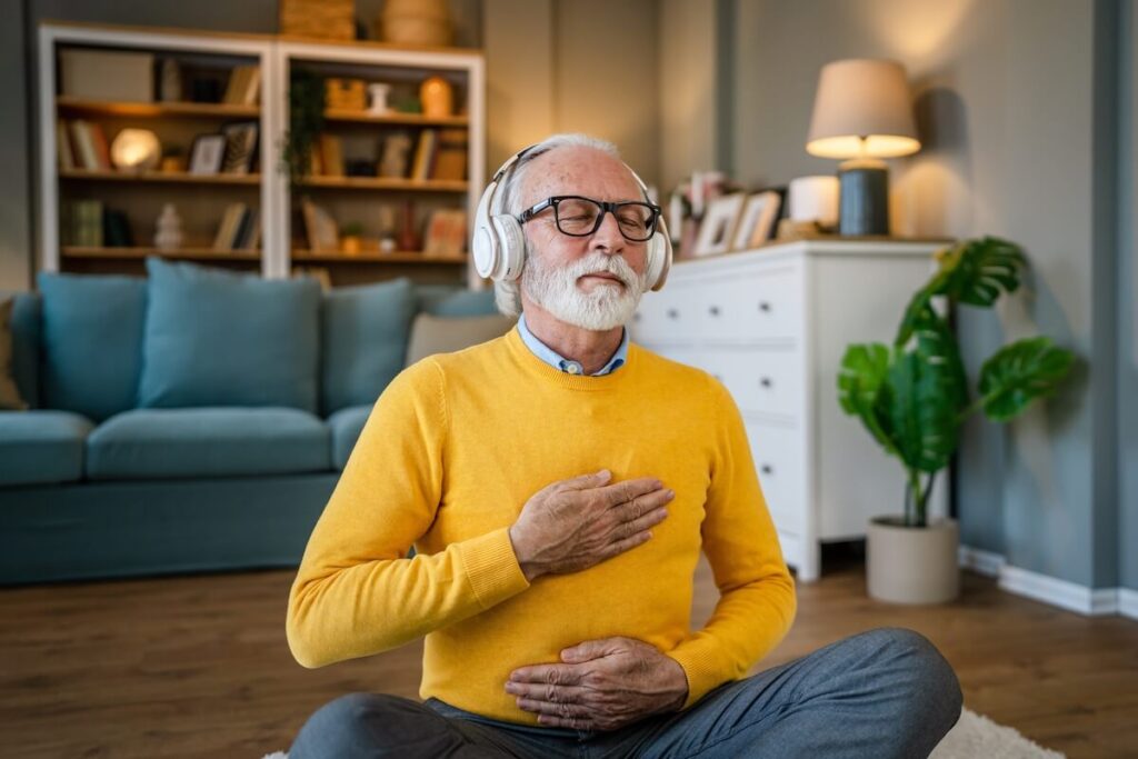 A senior using music therapy
