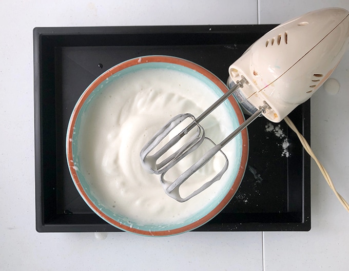 mixing aquafaba with hand mixer