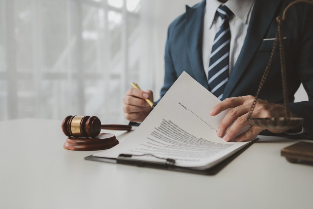 image of man in a suit looking at paperwork for new arizona rules for lawyers blog post