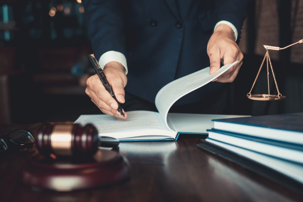 image of attorney writing on paper for thinking about retirement blog post