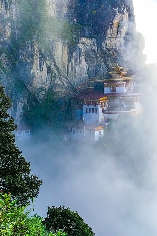 How Much Does It Cost To Travel To Bhutan? Paro Taktsang Tiger's Nest Temple Bhutan Himalayas