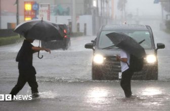 Millions urged to evacuate as Typhoon Dujuan hits Japan